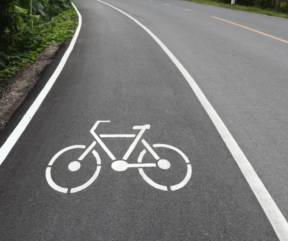 Bike lane on road with white bike painting